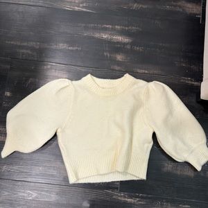 cream sweater